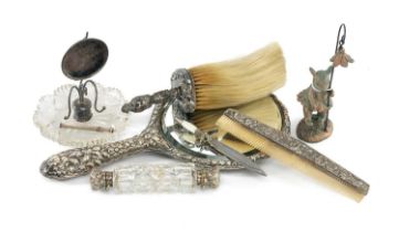 SILVER-BACKED HAND MIRROR, silver-mounted top hat brush, double-ended cut glass scent bottle,