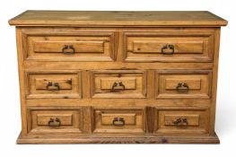 MODERN OAK EIGHT-DRAWER CHEST with iron handles, 90 (h) x 145 (w) x 58cms (d) Provenance: private