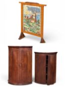 TWO ANTIQUE TWO-DOOR BOW FRONTED CORNER CUPBOARDS, larger 103 (h) x 68 (w) x 49cms (d), and a