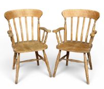 PAIR OF FARMHOUSE PINE SPINDLE-BACK ELBOW CHAIRS, 91 (h) x 57 (w) x 44cms (d) Provenance: private