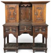 JACOBEAN STYLE OAK POT BOARD DRESSER with inverted front, two cupboard doors to the top and three