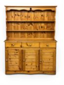 MODERN PINE KITCHEN DRESSER, two shelf rack, base with three drawers and three cupboard doors,