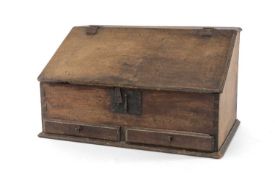 18TH CENTURY OAK TABLETOP BUREAU, angled fall with moulded edge, interior fitted with drawers and