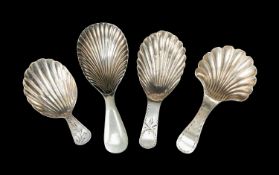 FOUR SCALLOP SHELL CADDY SPOONS, including bright cut border spoon, Peter & Ann Bateman, London