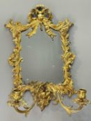 19TH CENTURY GILT BRONZE ROCOCO GIRANDOLE, ribbon-tied crest above flowering foliate borders and