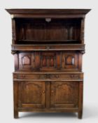 18TH CENTURY WELSH OAK TRIDARN, panel-back canopy top on turned supports, central section of arch
