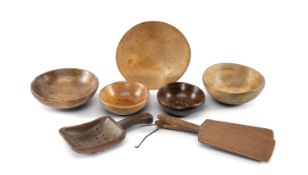 ASSORTED DAIRY TREEN, comprising four turned bowls of various sizes, shallow circular dairy skimmer,
