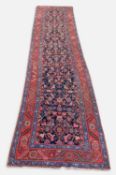 PERSIAN MALAYER RUNNER, stylised flower and serrated leaf and vine indigo field, red flowerhead