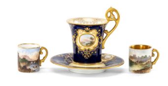 COALPORT CABINET PORCELAIN, comprising a cabinet cup and stand painted with landscape in oval