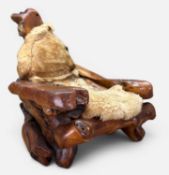 LARGE MID-CENTURY CALIFORNIAN REDWOOD SCULPTURAL LOUNGE CHAIR, attributed to Daryl Stokes, peg