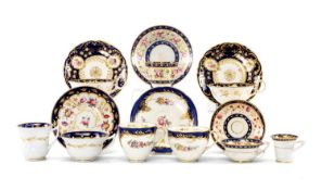 ASSORTED 19TH CENTURY ENGLISH BONE CHINA CUPS & SAUCERS, variously painted with flowers on gilt-