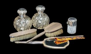 SILVER DRESSING TABLE ACCESSORIES, comprising good pair of cut glass and silver-mounted toilet