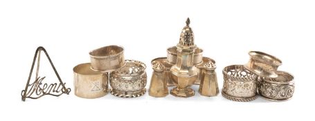 ASSORTED SILVER TABLEWARE, including napkin rings, menu holder, piriform pepperette, pair small