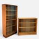 TWO MID-CENTURY TEAK & GLASS BOOKCASES, 144 (h) x 69 (w) x 28cms (d) & 83 (h) x 92 (w) x 24cms (d) - Image 1 of 2