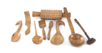 ASSORTED TREEN KITCHEN UTENSILS, comprising three butter curlers, two butter spoons, oat roller, and
