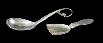 TWO GEORG JENSEN SILVER SPOONS, comprising a pattern No. 21 'peapod' condiment ladle, circa 1927-30,