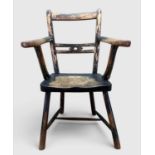 PRIMITIVE ELM & ASH ARMCHAIR, 19th Century, retaining traces of dark green paint, the tapering