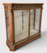 FINE LOUIS XVI STYLE ORMOLU & TULIPWOOD VITRINE BY H. J. HATFIELD & SONS richly decorated with