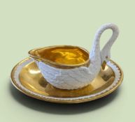 SÈVRES-STYLE PORCELAIN SWAN CREAM BOAT & STAND, French 19th Century, modelled in the bisque body