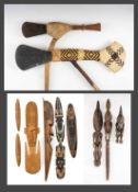 TWO CURRENCY AXES, Papua New Guinea, one with decorative rattan woven haft, both with inset flat