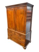 LATE GEORGE III MAHOGANY LINEN PRESS, circa 1820, dentil cornice over two moulded panel doors