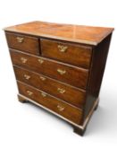 PROVINCIAL OAK CHEST OF DRAWERS, late 18th century, with later brass handles and restorations,