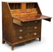 LATE GEORGE III MAHOGANY BUREAU, circa 1820, fitted interior faced with stained birch over four long