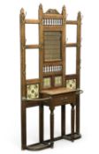 ARTS & CRAFTS OAK MIRRORED HALL STAND, circa 1890, back inset with four ceramic tiles, having a