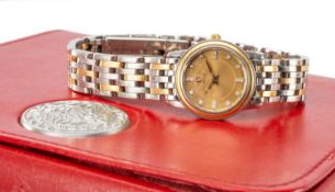 OMEGA LADIES' BI-COLOUR STAINLESS STEEL QUARTZ WRISTWATCH, circa 2004, gilt round dial with