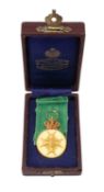 RARE SWEDEN GOLD ORDER OF VASA MEDAL on green ribbon, instituted in 1772, high carat gold, marked '