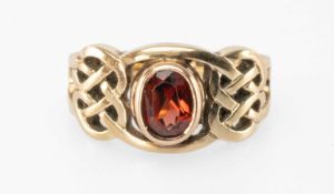 9CT GOLD & GARNET DRESS RING in the Celtic style, size N, 4.9g Provenance: private collection