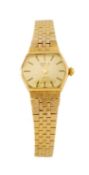 9CT GOLD MARVIN LADIES' BRACELET WATCH, hexagonal gold toned dial applied with baton markers, bark