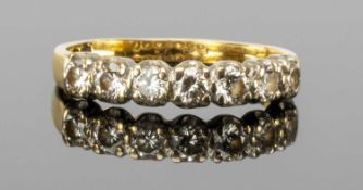 DIAMOND SEVEN-STONE RING, total diamond weight estimated as 0.7ct, well-matched in colour, estimated