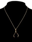 9CT GOLD WISHBONE PENDANT on yellow metal fine chain, 45cms long, 4.7g in box Provenance: private