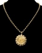 VICTORIA SOVEREIGN, 1862, mounted within a 9ct gold shell-bordered pendant, 34mms (diam.), suspended