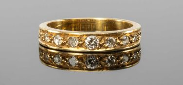18CT DIAMOND HALF-HOOP ETERNITY RING set with nine brilliant-cut diamonds, graduated from 0.1ct to