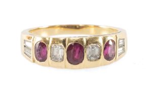 YELLOW METAL NINE-STONE RUBY & DIAMOND RING, the five diamonds of tapering baguette and cushion cut,