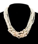 BOXED MULTI-ROW FRESHWATER PEARL NECKLACE, featuring white and pink coloured irregularly shaped