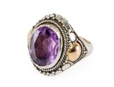 GENTLEMAN'S PRESUMED AMETHYST RING mounted in silver with gold accents, size P Provenance: private