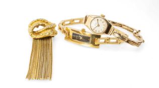 VERTEX REVUE LADIES' 9CT GOLD-CASED WRISTWATCH on a 9ct gold expandable bracelet (manual wind