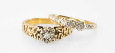 DIAMOND SOLITAIRE RING, the small brilliant illusion-set in white gold on a textured yellow gold