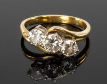 18CT THREE-STONE DIAMOND RING set with three brilliant-cut stones, total diamond weight approx. 0.