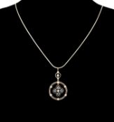 ATTRACTIVE DIAMOND, PEARL & SAPPHIRE PENDANT, circa 1910-20, quatrefoil set with four round-cut