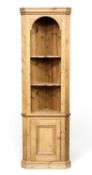 STRIPPED PINE FLOOR-STANDING CORNER CUPBOARD with base cupboard door, 187 (h) x 60 (w) x 34cms (d)
