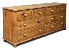MODERN LONG PINE CHEST of multi drawers, 72 (h) x 175 (w) x 46cms (d) Provenance: private collection