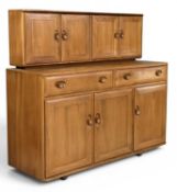 ERCOL BUFFET SIDEBOARD 507B in elm, upper section with four cupboard doors, over base of two