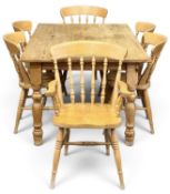 STRIPPED PINE DINING TABLE, 77 (h) x 157 (w) x 161cms (d); and a set of six (4+2) spindle-back