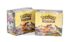 POKÉMON SWORD & SHIELD: DARKNESS ABLAZE, two factory-sealed booster boxes, each box containing