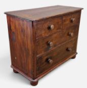 SMALL 19TH CENTURY STAINED PINE CHEST, two short over two long graduated drawers, turned handles,