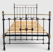 ANTIQUE BRASS & CAST IRON DOUBLE BED, dark green frame with brass top rails and decoration, raised